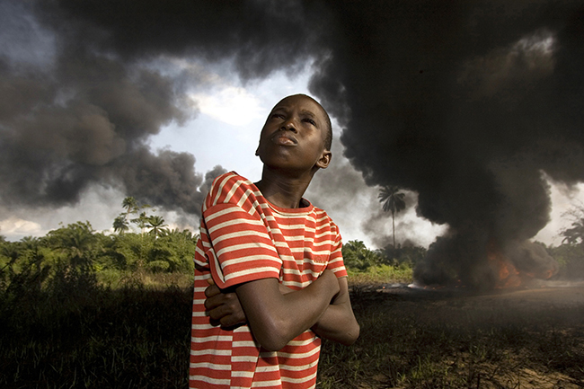 George Osodi. <em>Ogony Boy</em>, 2007. Chromogenic print 80 x 120 cm (31.5 x 47.2 in.). Courtesy the artist and Z Photographic Ltd. Ogony Boy